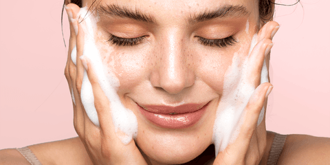 Cleansing foam skincare at the sink